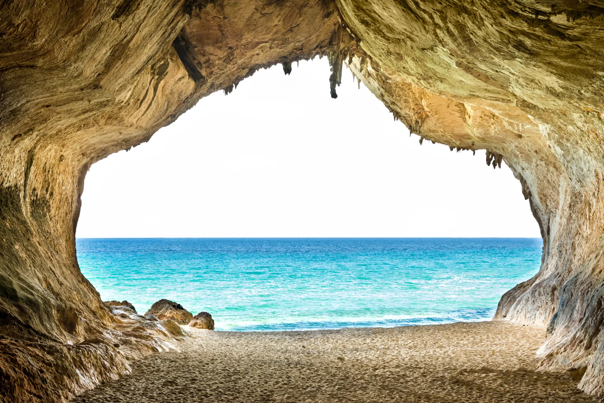 Discover Sardinia’s hidden beaches through breathtaking sea caves